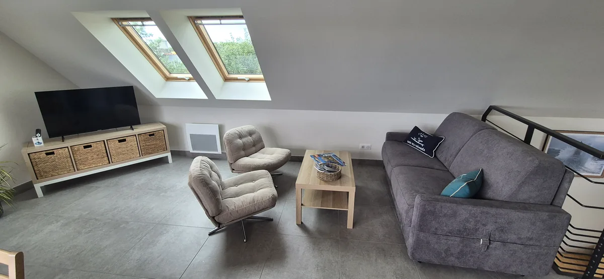 Maison 2 · Vue sur la baie et séjour panoramique — Salon